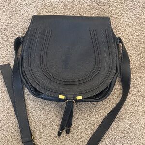 Chic Black Leather Chloe Saddle Bag